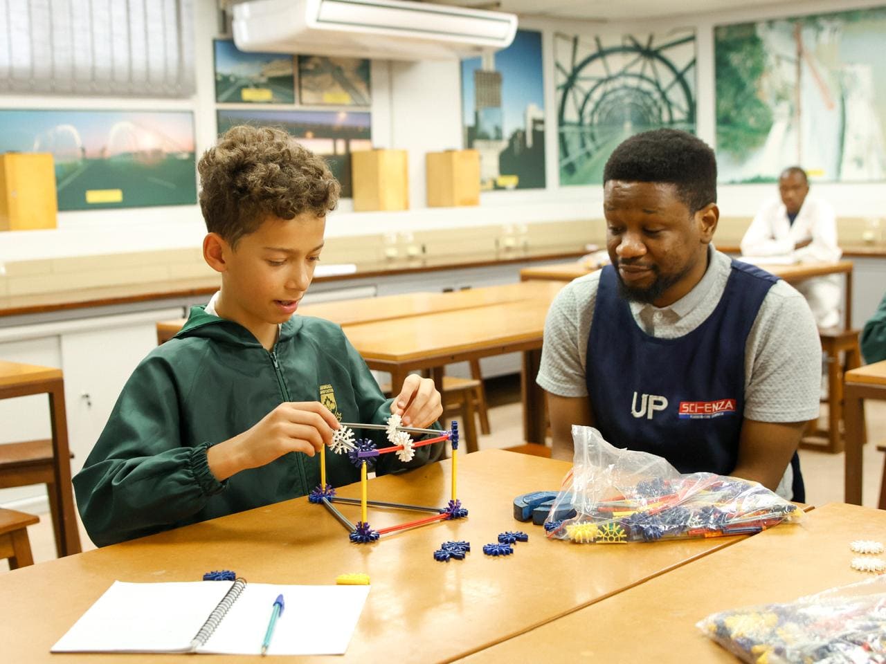 Blooming Futures Foundation learner taking part in hands-on science education